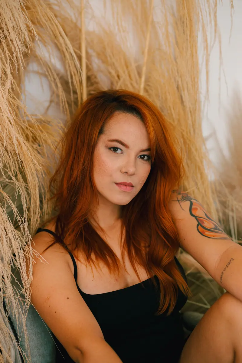 Red waves and a colorful tattoo