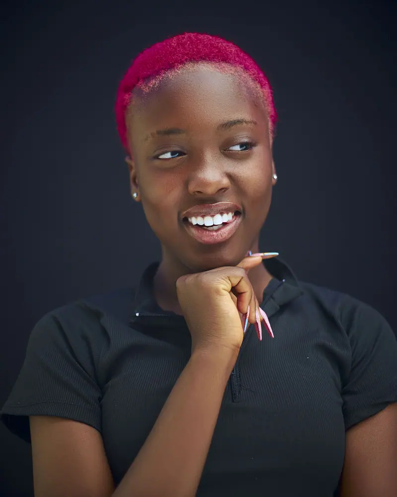 Smiling client with a magenta crop