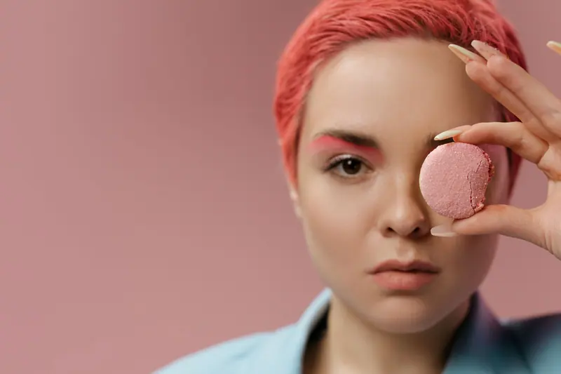 Pink hair and a pink macaron