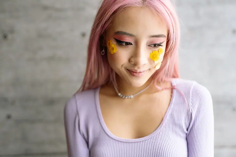 Pink hair and floral makeup