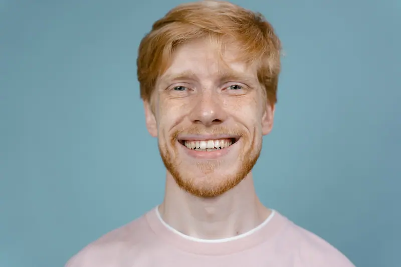Smiling man with ginger hair