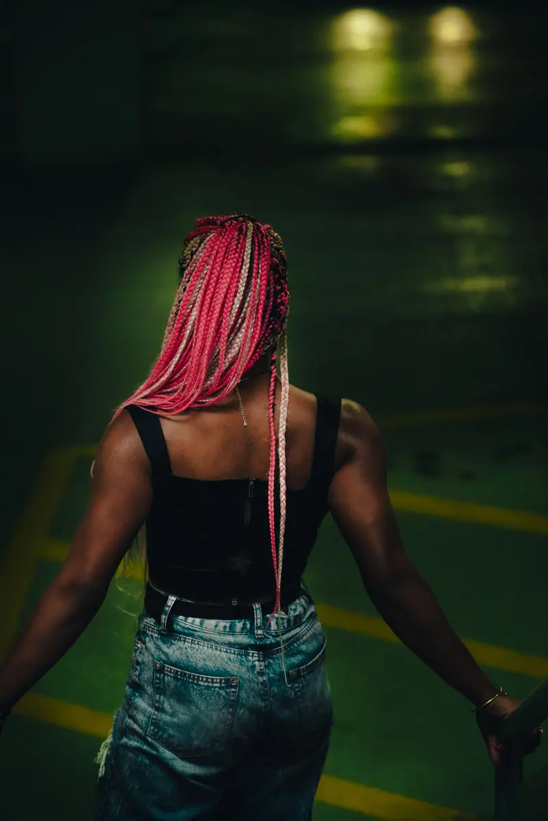 Long pink braids from behind