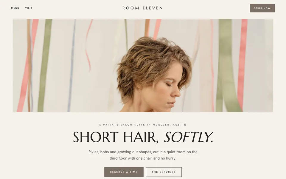Room Eleven website design — centered luxury minimal layout